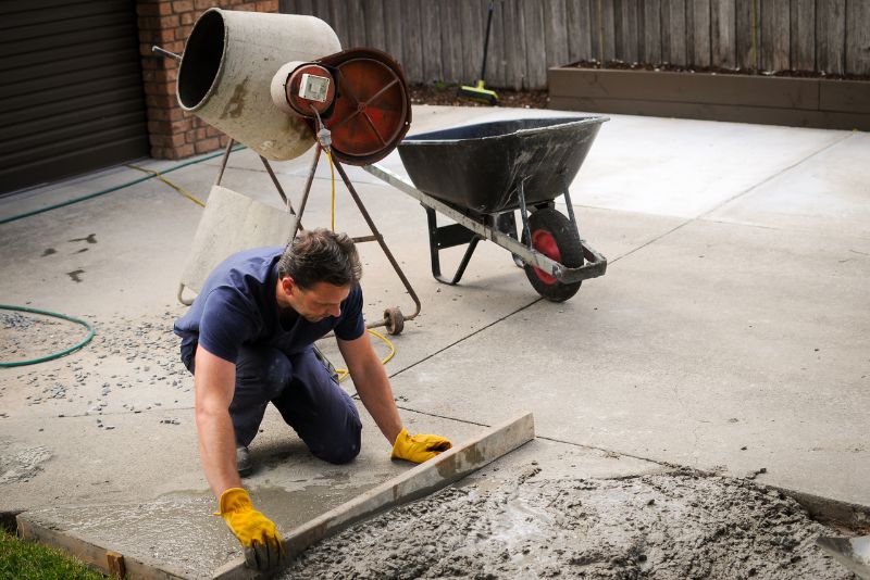 a mason repairing a driveway
