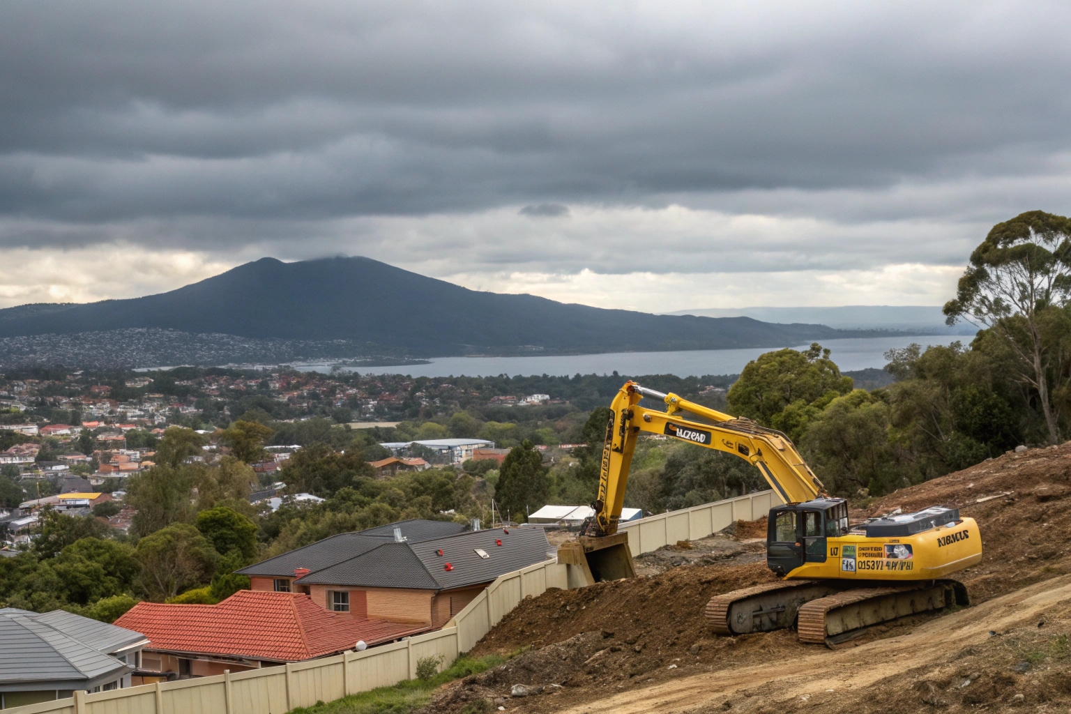 Bulk excavation work on sloped residential development site in Hobart Tasmania