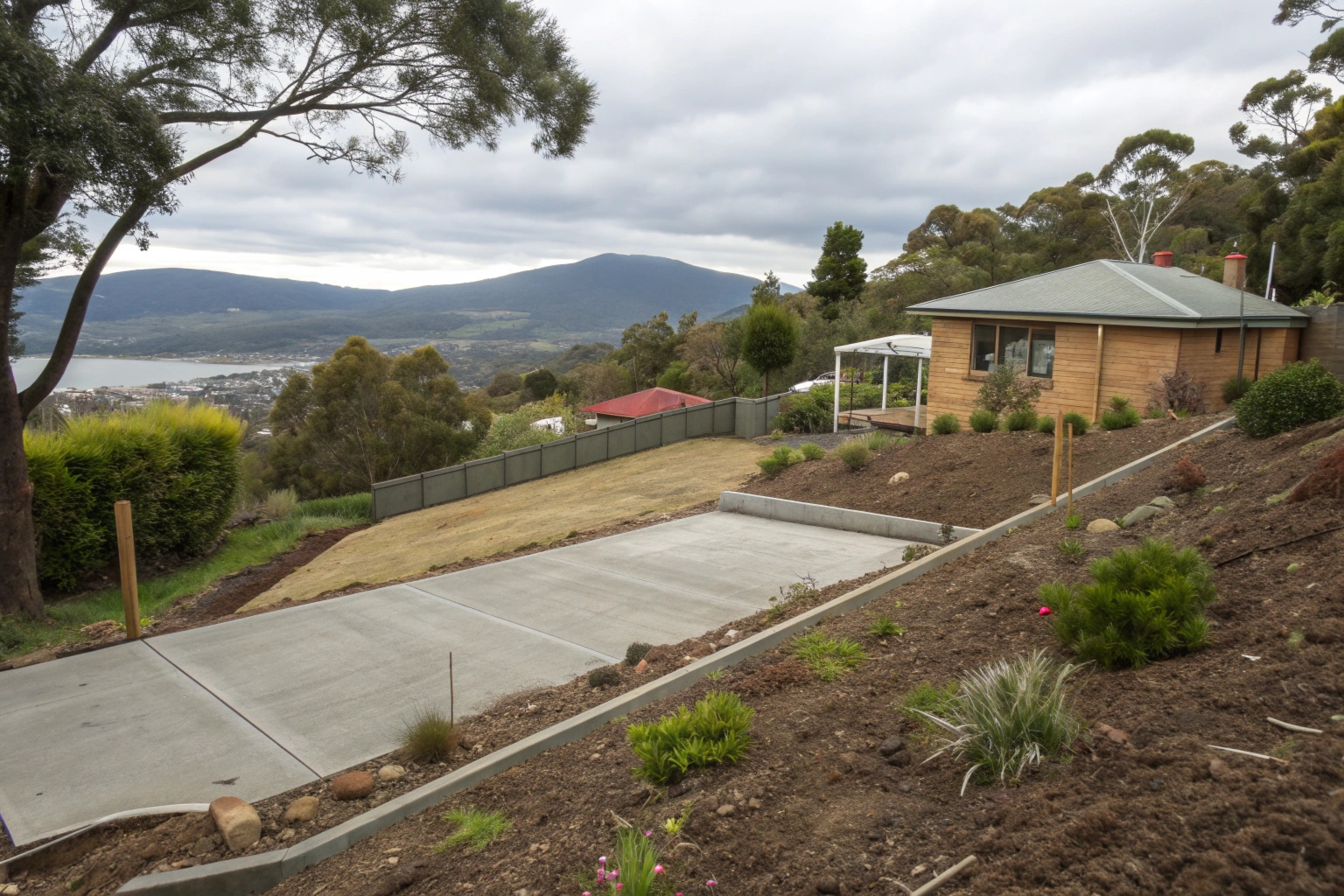 Levelled site preparation on sloped Hobart property ready for concrete work